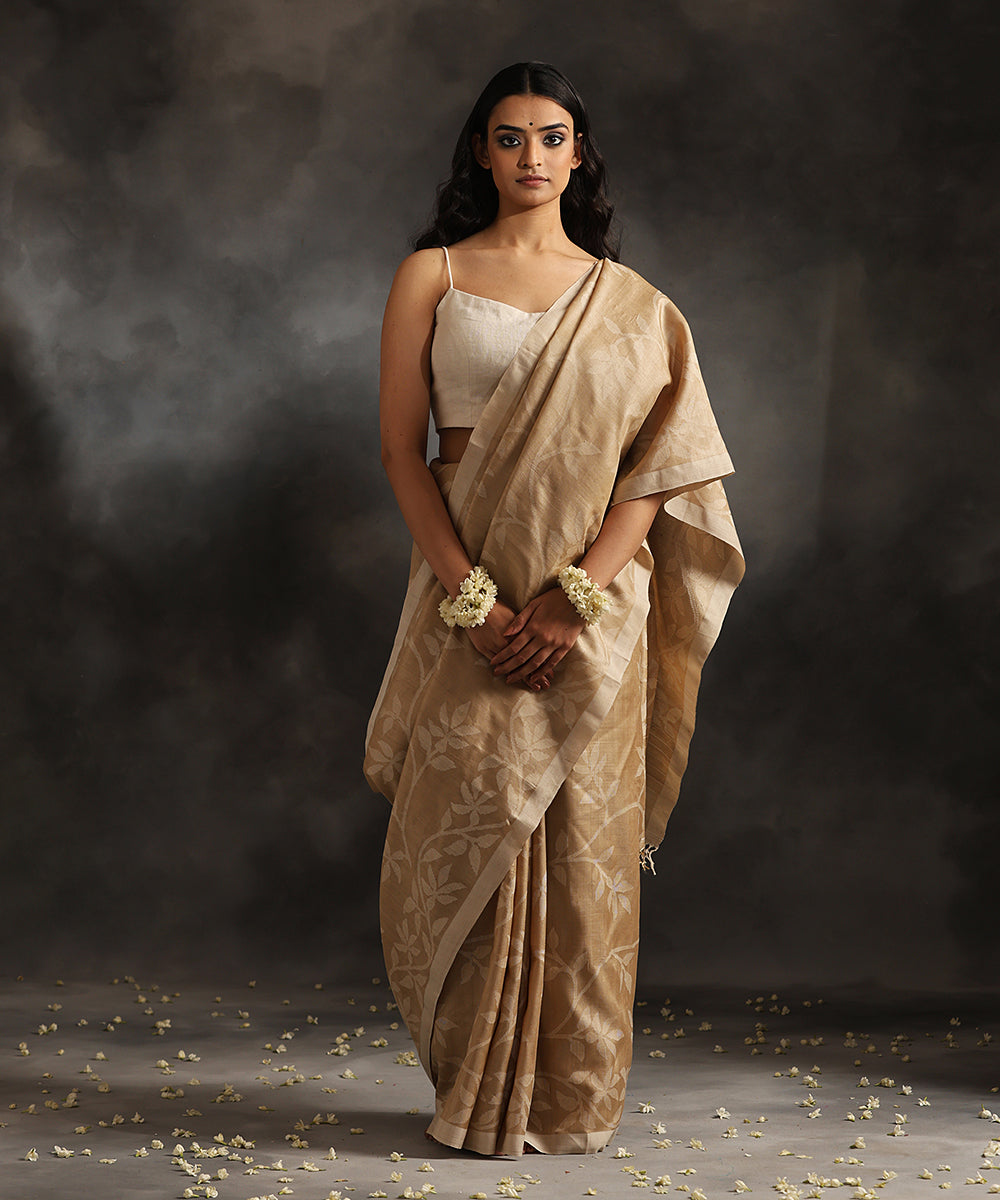 Beige Handloom Pure Tussar Dhakai Jamdani Saree With Offwhite Floral Bel Border