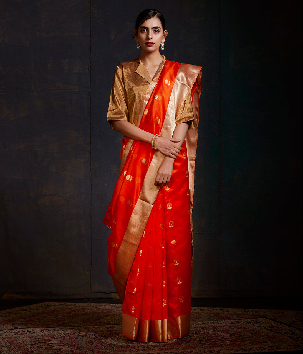 Orange_Chanderi_Silk_Saree_with_Floral_Motifs_in_gold_and_silver_Zari_WeaverStory_02