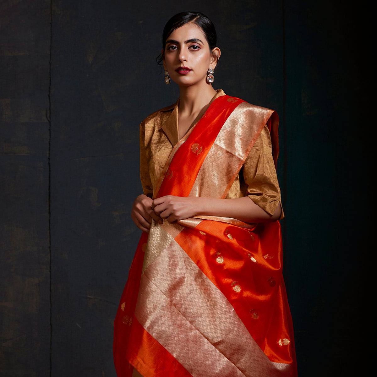 Orange_Chanderi_Silk_Saree_with_Floral_Motifs_in_gold_and_silver_Zari_WeaverStory_01