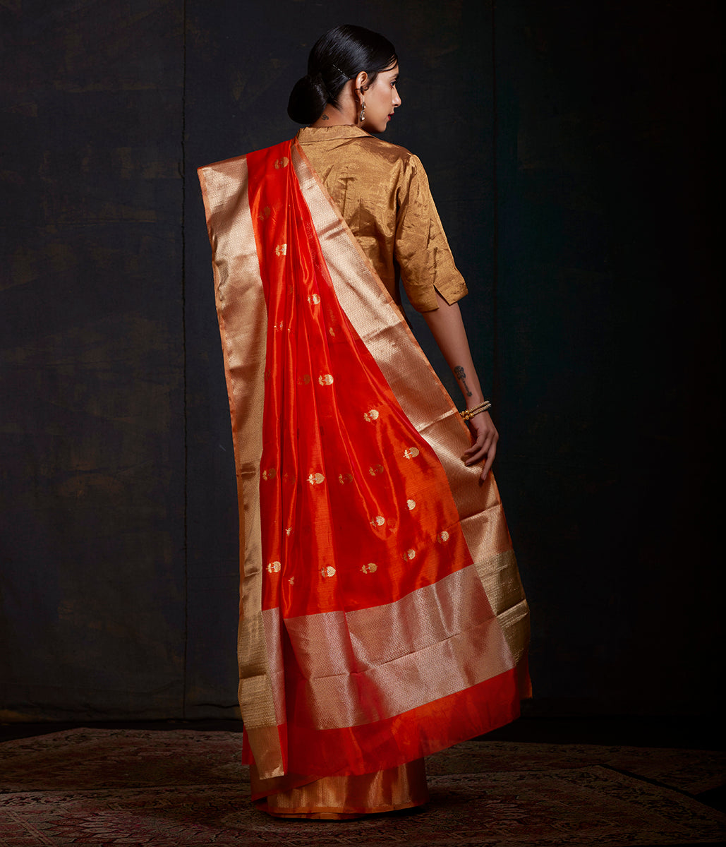 Orange_Chanderi_Silk_Saree_with_Floral_Motifs_in_gold_and_silver_Zari_WeaverStory_03