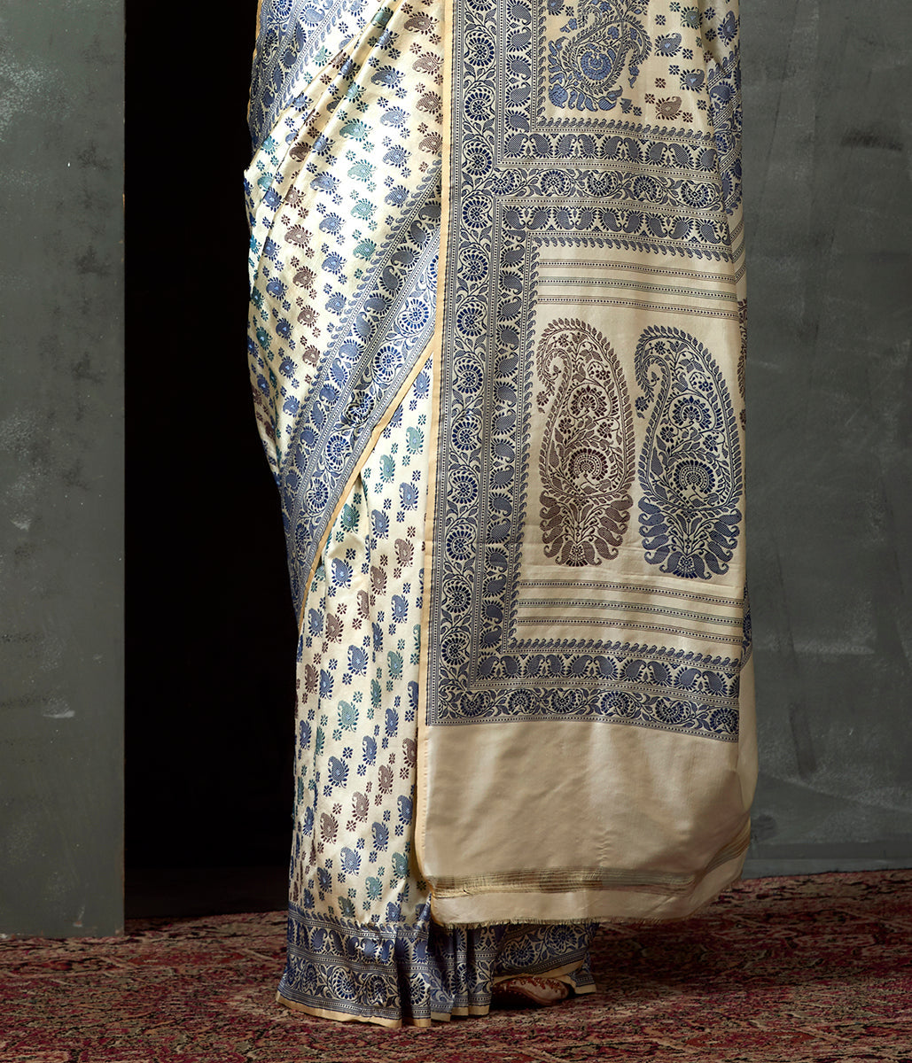 Handwoven_Banaras_Baluchari_in_Offwhite_with_Blue_and_Green_Kairi_and_Koniya_WeaverStory_04