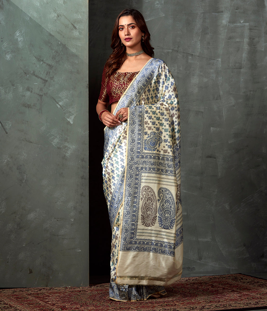 Handwoven_Banaras_Baluchari_in_Offwhite_with_Blue_and_Green_Kairi_and_Koniya_WeaverStory_02