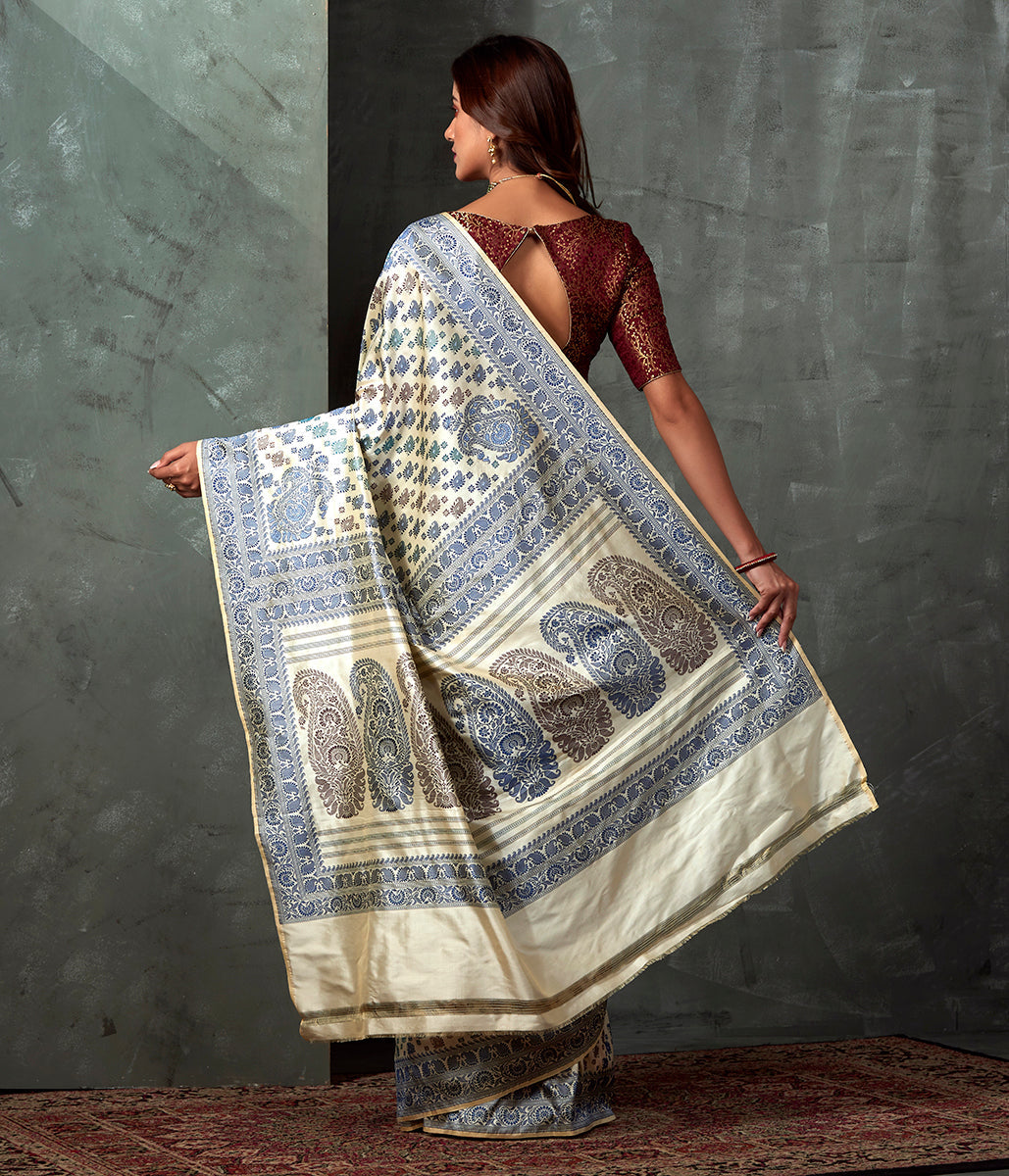 Handwoven_Banaras_Baluchari_in_Offwhite_with_Blue_and_Green_Kairi_and_Koniya_WeaverStory_03