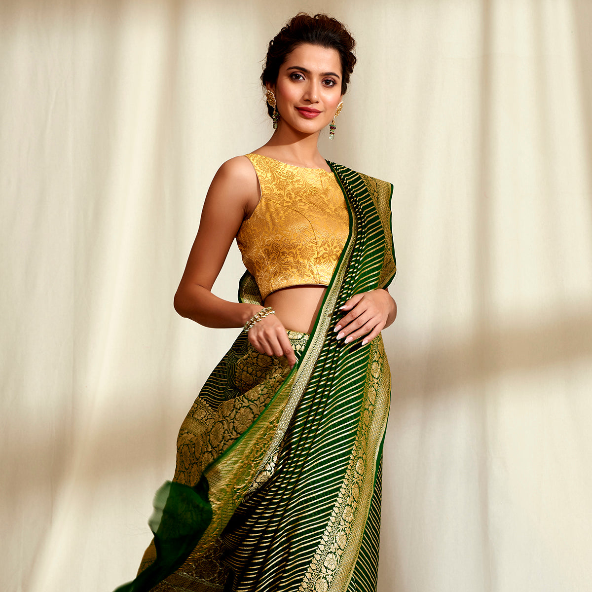 Handwoven_Banarasi_Georgette_Saree_in_Dark_Green_with_Diagonal_Weave_WeaverStory_01