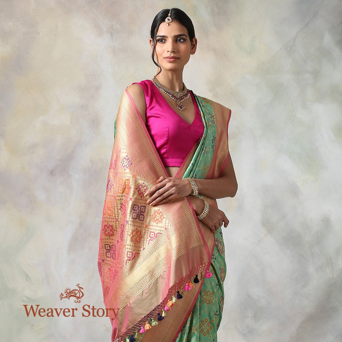 Handwoven_Banarasi_Patola_Saree_in_Green_and_Pink_WeaverStory_01