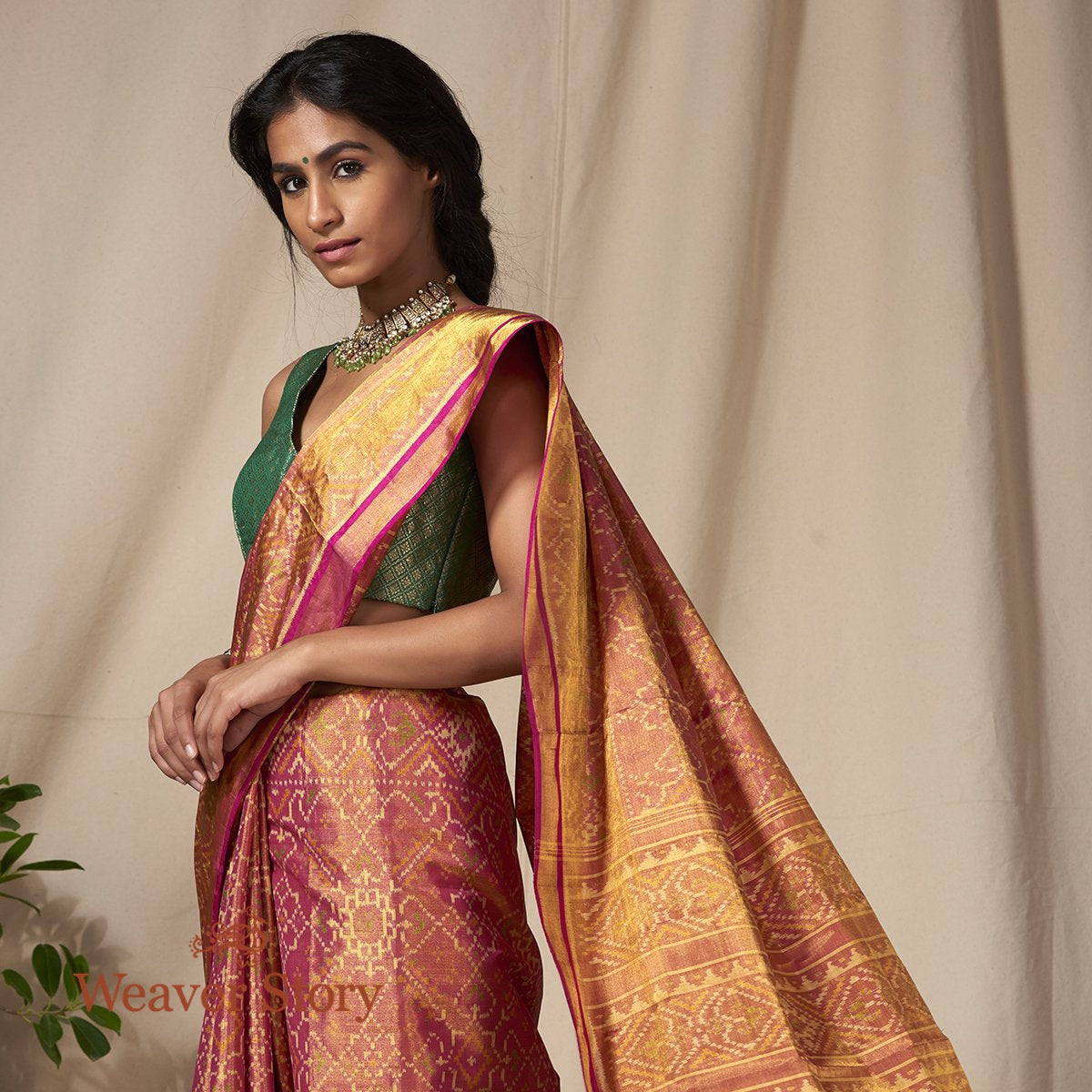 Handwoven_Silk_Tissue_Gujarat_Patola_Saree_in_Red_and_Gold_WeaverStory_01