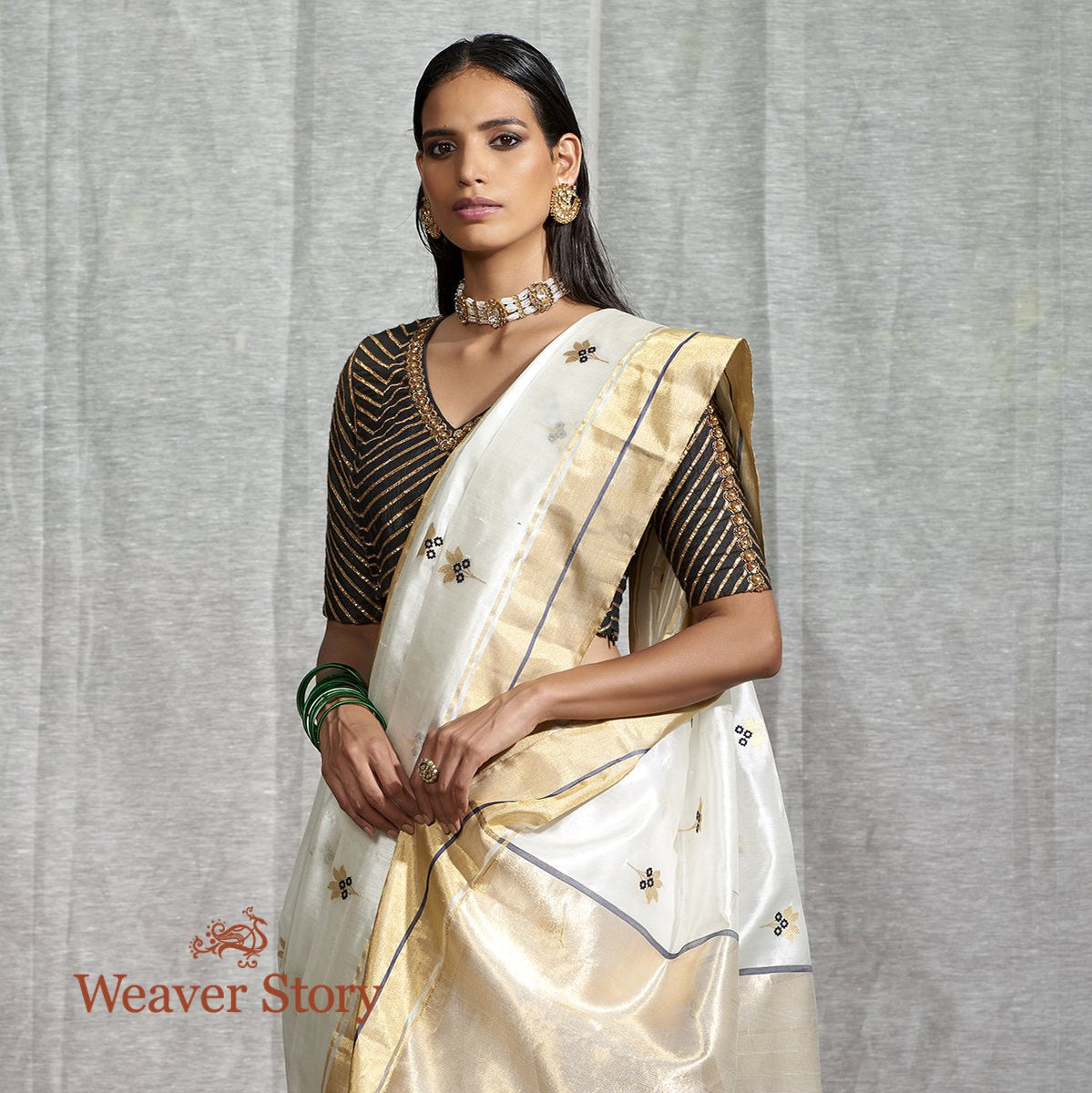 Handwoven_White_Silk_Chanderi_Saree_with_Floral_Booti_and_Blue_Meenakari_WeaverStory_01