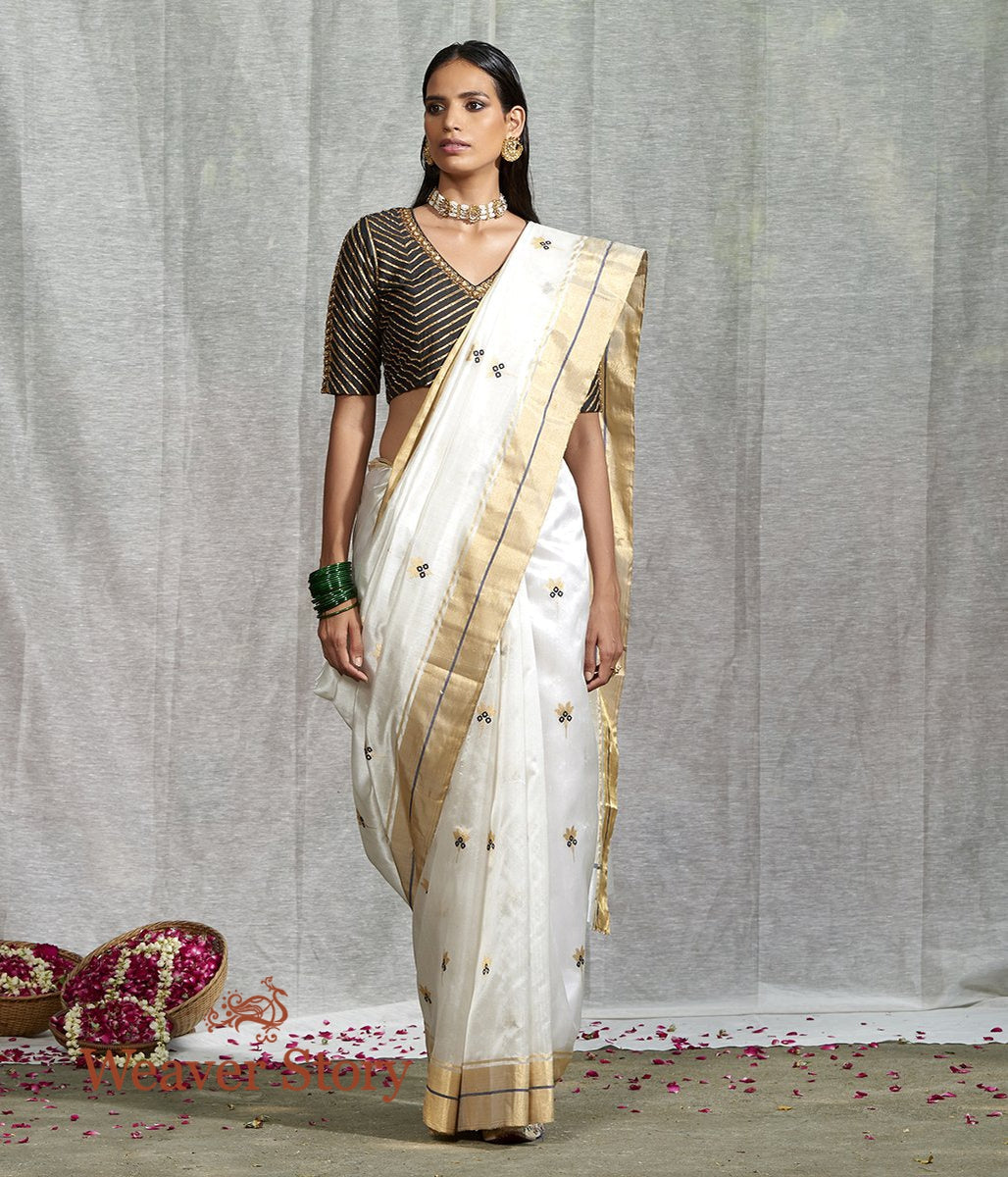 Handwoven_White_Silk_Chanderi_Saree_with_Floral_Booti_and_Blue_Meenakari_WeaverStory_02