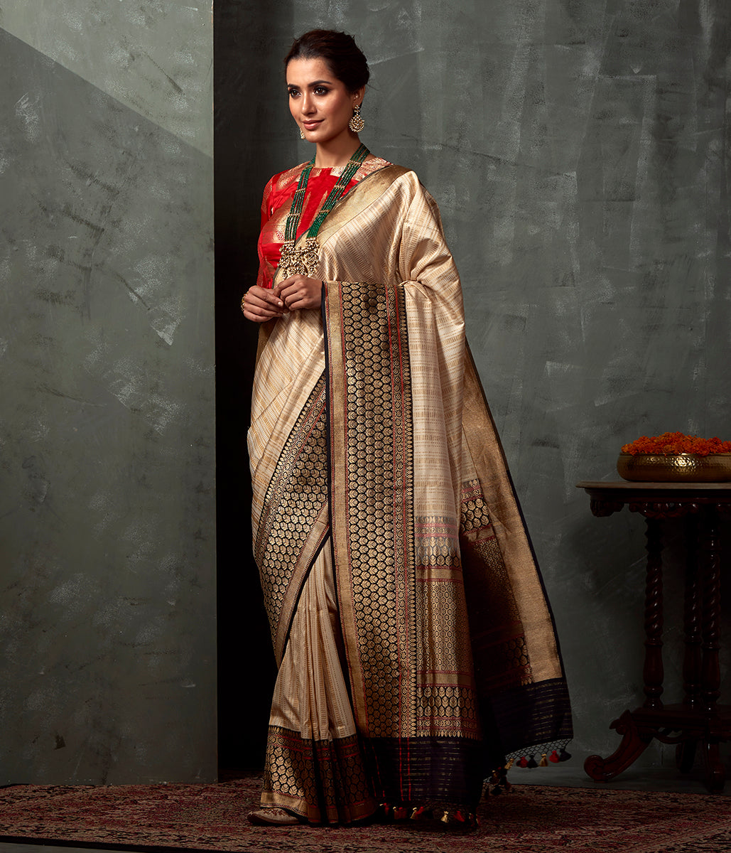 Handwoven_Cream_and_Gold_Tanchoi_Saree_with_Heavy_Black_Kadhwa_Weave_Border_WeaverStory_02
