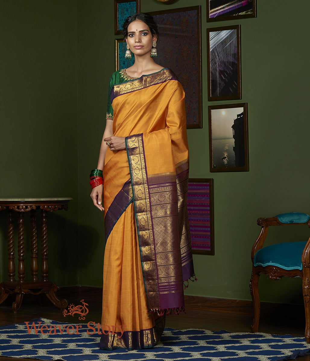 Handwoven_Mustard_Pure_Zari_Kanjivaram_Saree_with_Purple_Border_WeaverStory_02