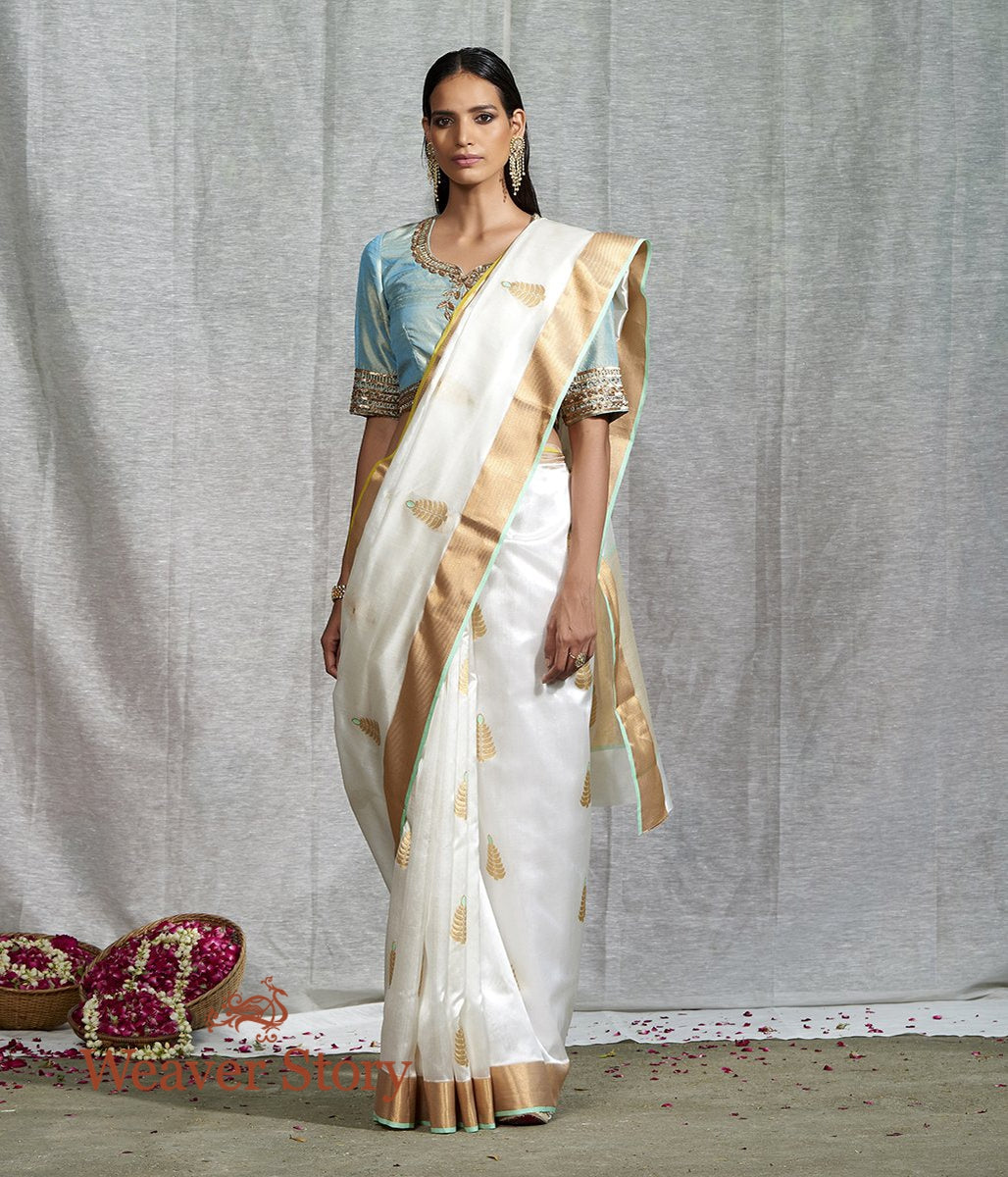 Handloom_White_Silk_Saree_with_Meena_Boota_and_Green_Selvedge_WeaverStory_02