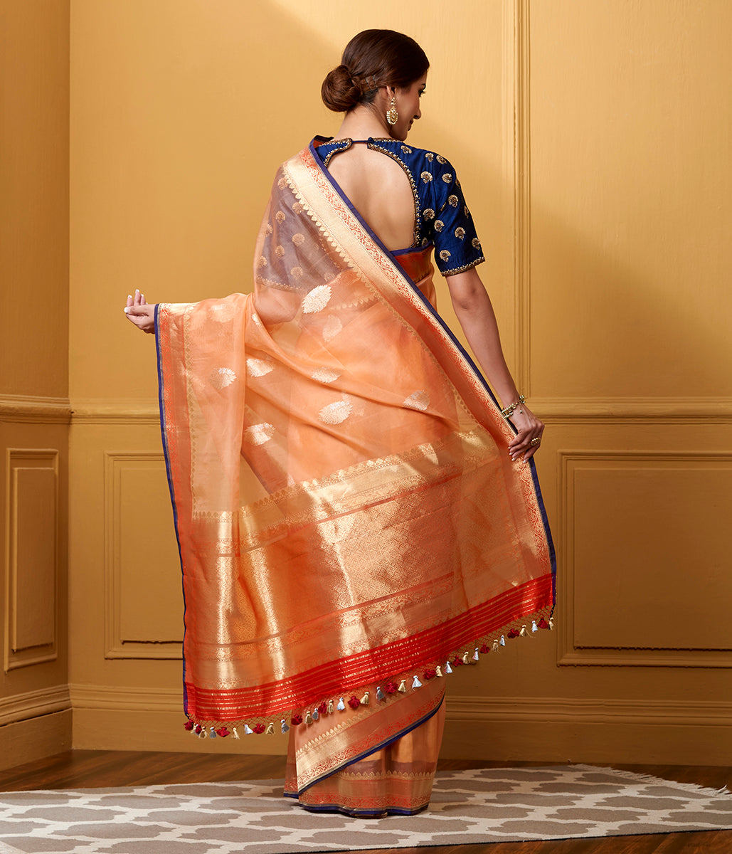 Handloom_Peach_Kadhwa_Kora_Saree_with_Red_Border_Palu_WeaverStory_03