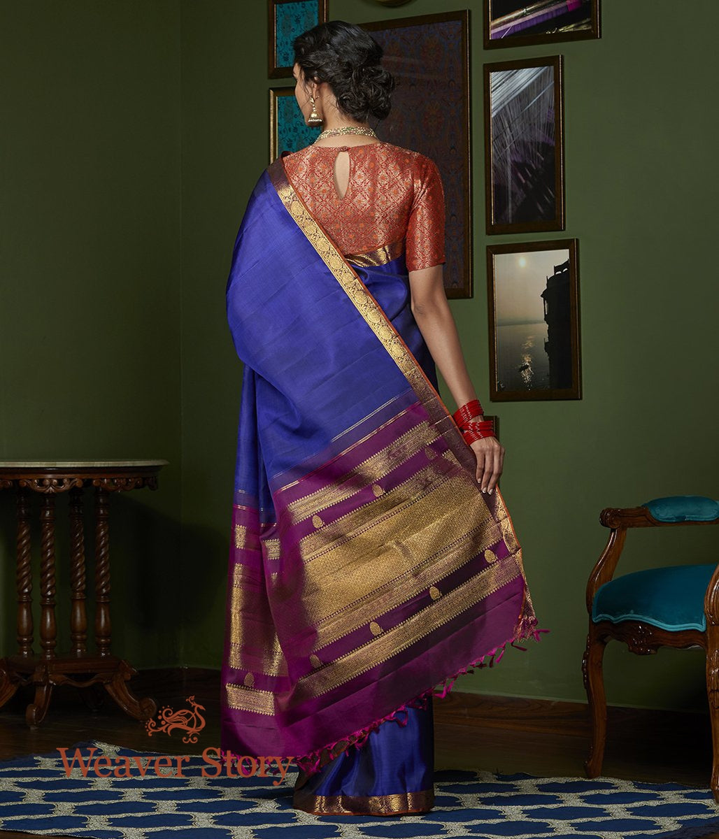 Handwoven_Purple_Pure_Zari_Kanjivaram_Saree_with_Rust_Floral_Border_WeaverStory_03
