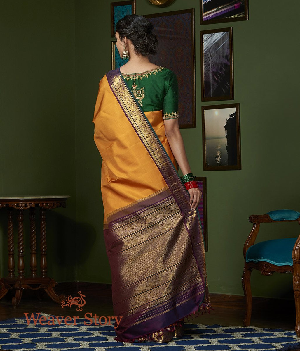 Handwoven_Mustard_Pure_Zari_Kanjivaram_Saree_with_Purple_Border_WeaverStory_03