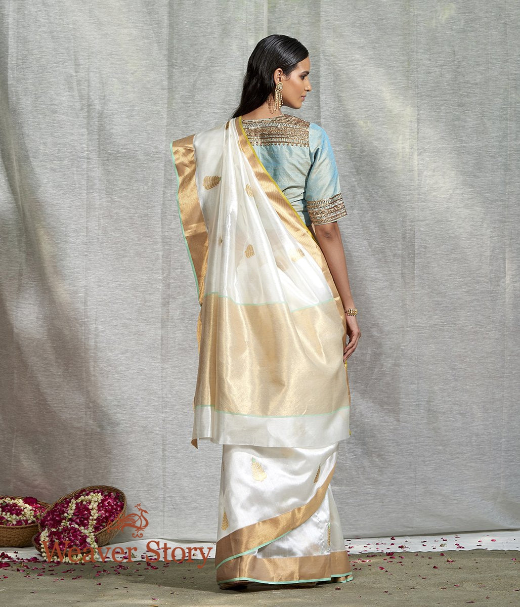 Handloom_White_Silk_Saree_with_Meena_Boota_and_Green_Selvedge_WeaverStory_03