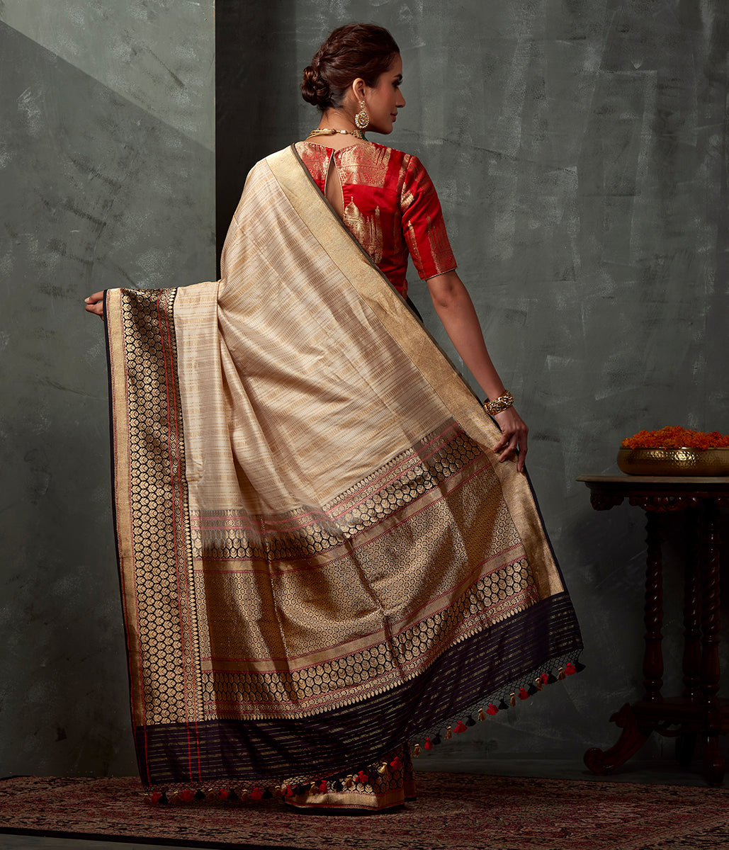 Handwoven_Cream_and_Gold_Tanchoi_Saree_with_Heavy_Black_Kadhwa_Weave_Border_WeaverStory_03