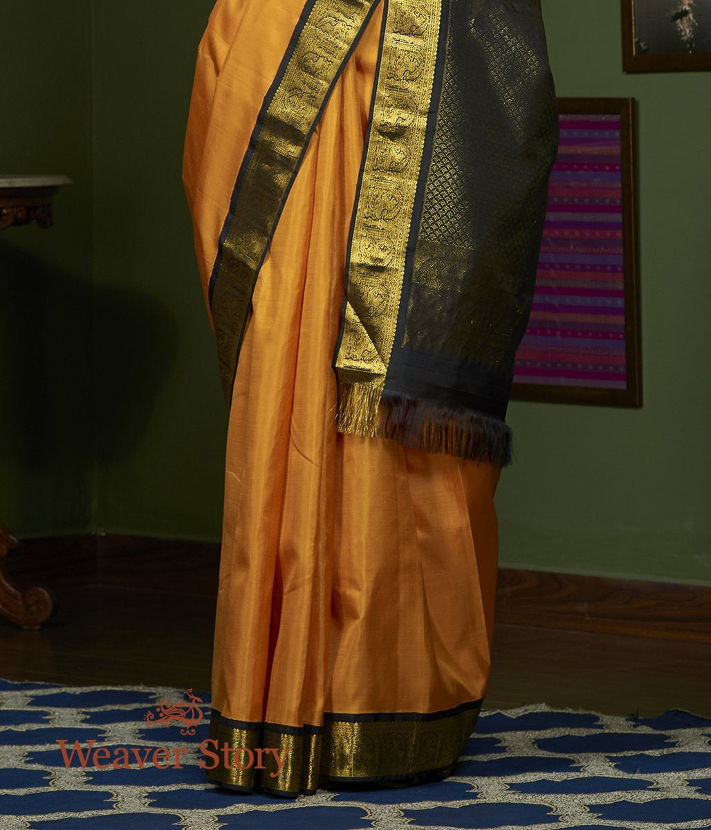 Handloom_Yellow_Kanjivaram_Silk_Saree_with_Black_Border_and_Pallu_WeaverStory_04