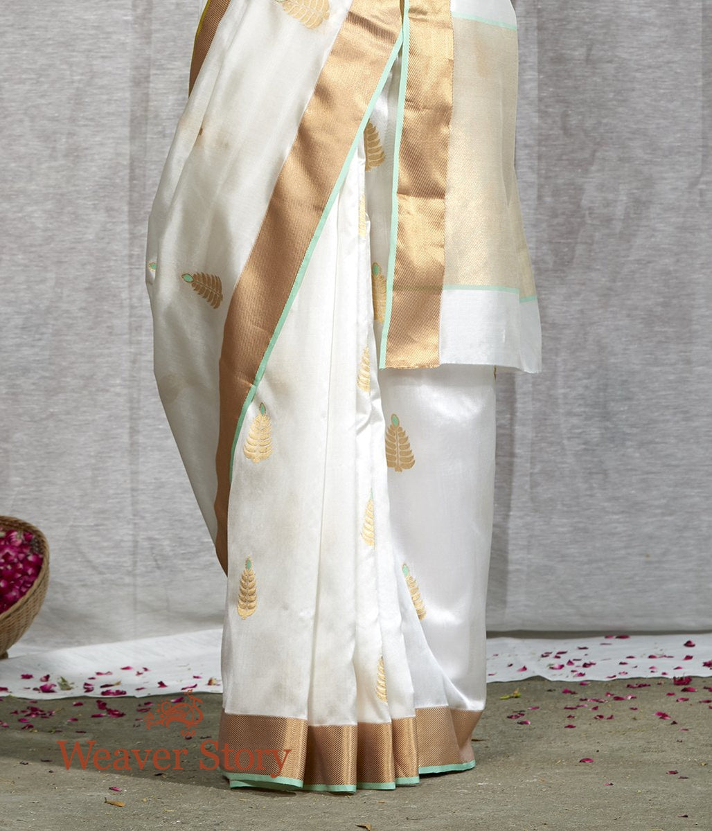 Handloom_White_Silk_Saree_with_Meena_Boota_and_Green_Selvedge_WeaverStory_04