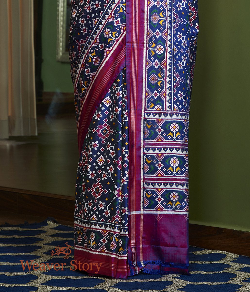 Handwoven_Double_Ikat_Patan_Patola_Saree_in_Blue_and_Purple_WeaverStory_04