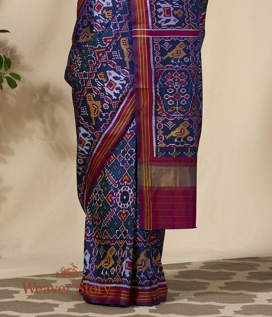 Handwoven_Blue_and_Teal_Dual_Tone_Gujarat_Patola_Saree_with_Purple_Border_WeaverStory_04