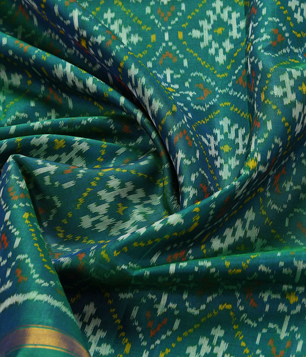 Handloom_Single_Ikat_Patola_Dupatta_in_Green_WeaverStory_05