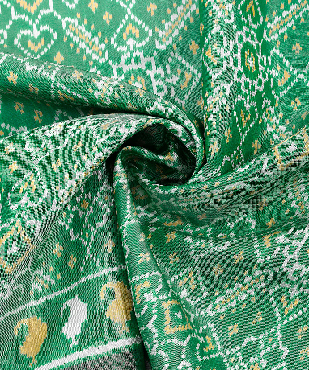 Handloom_Mint_Green_8_Ply_Pure_Mulberry_Silk_Ikat_Patola_Dupatta_With_Striped_Palla_WeaverStory_05