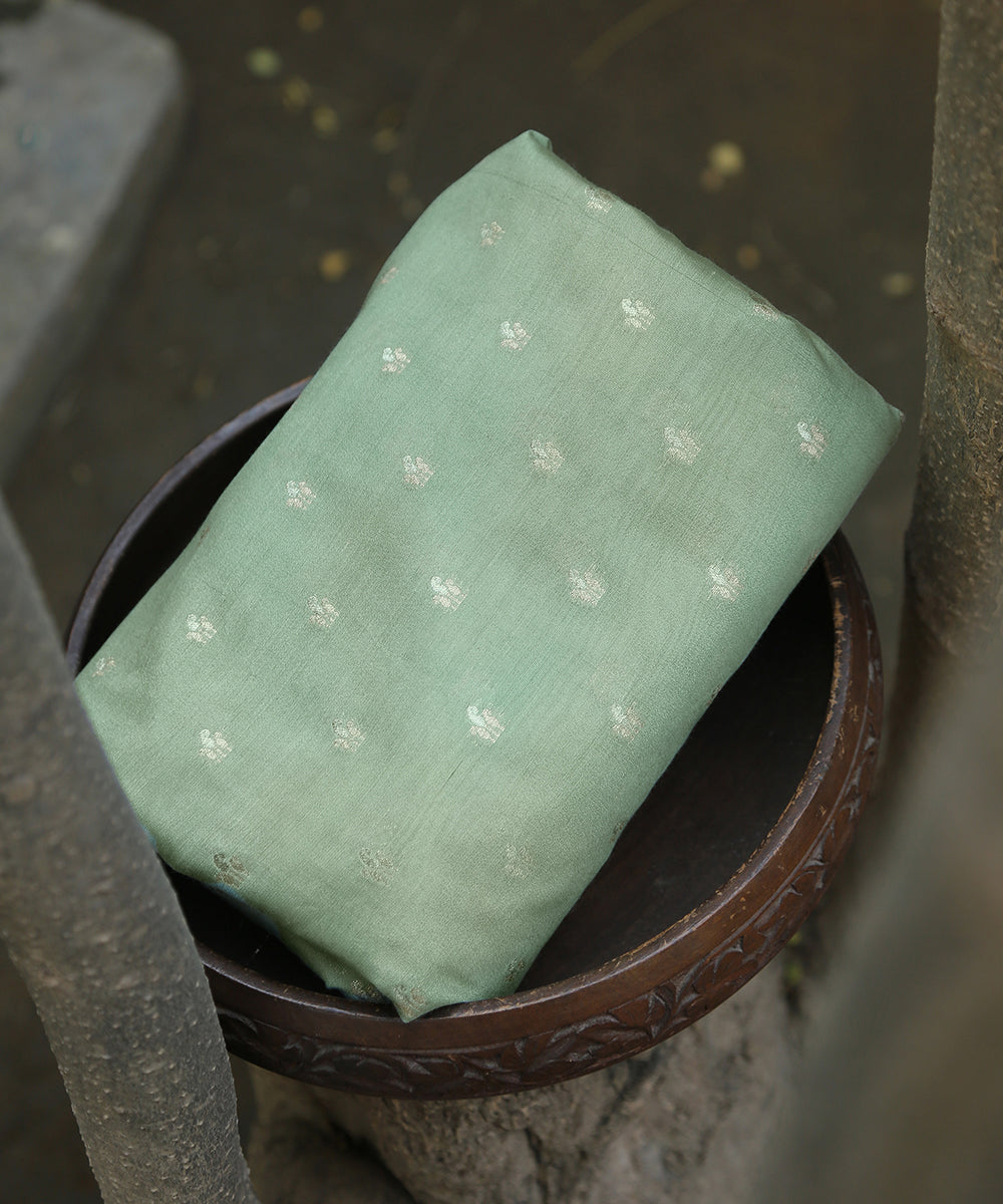 Handloom_Pastel_Mint_Green_Pure_Moonga_Silk_Banarasi_Fabric_With_Cutwork_Sona_Rupa_Booti_WeaverStory_01