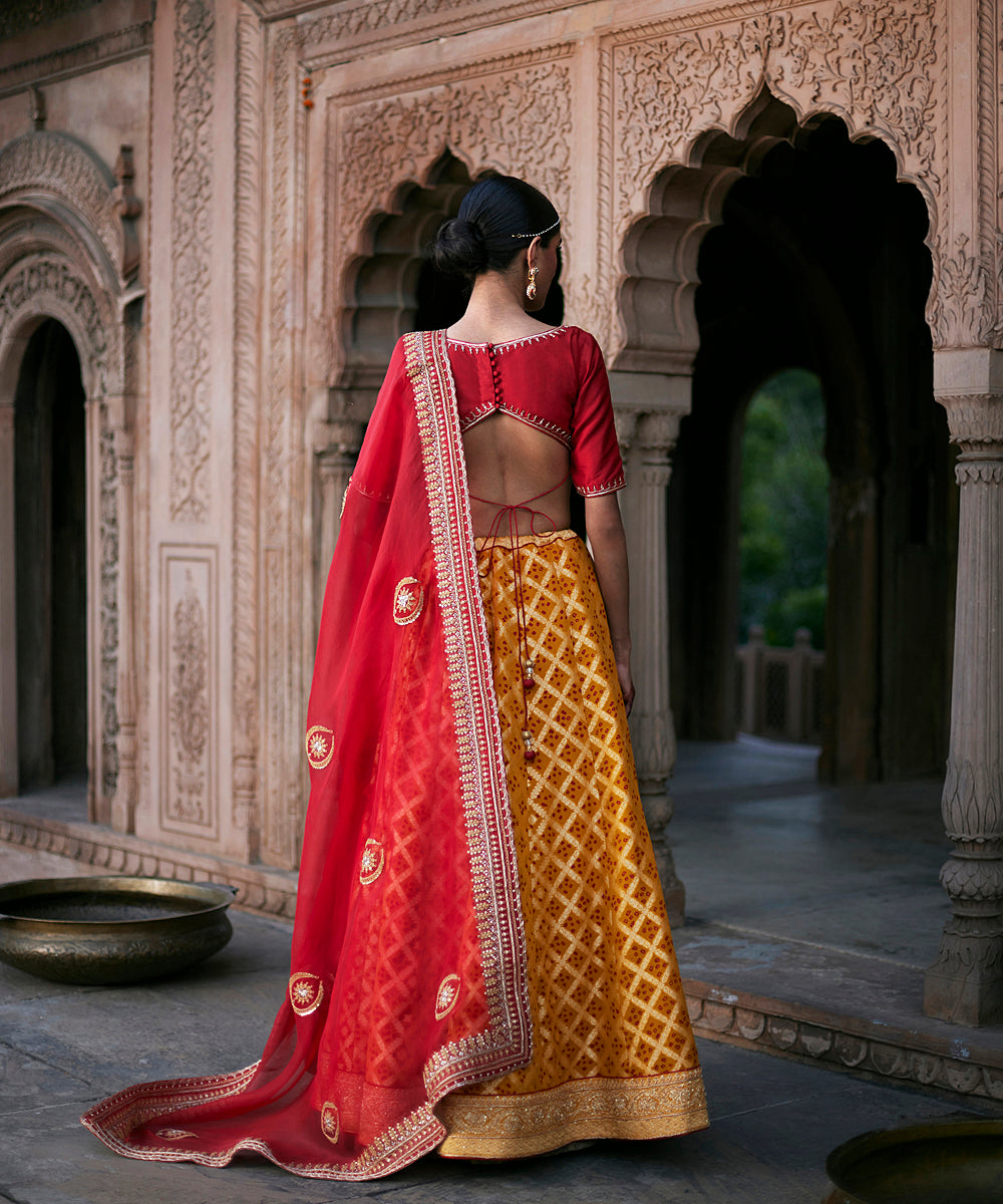 Yellow_Georgette_Banarasi_Bandhej_Lehenga_With_Red_Blouse_And_Dupatta_And_Yellow_Belt_WeaverStory_04