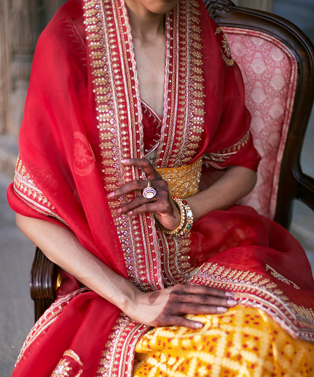 Yellow_Georgette_Banarasi_Bandhej_Lehenga_With_Red_Blouse_And_Dupatta_And_Yellow_Belt_WeaverStory_05