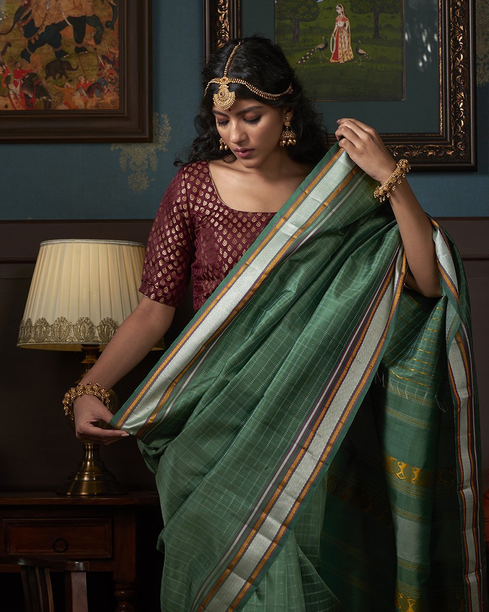 Green_Handloom_Checks_Kanjivaram_Silk_Saree_With_Plain_Border_WeaverStory_01