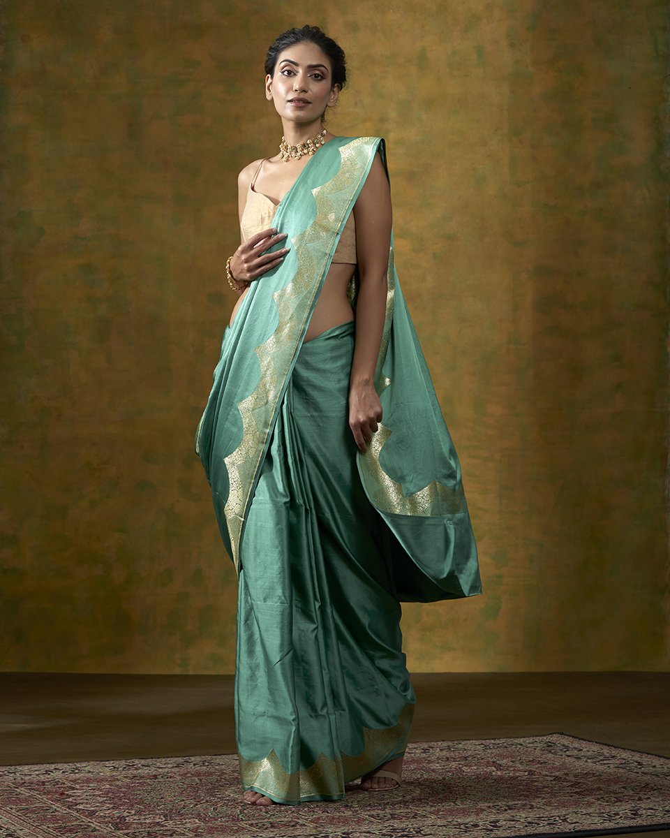 Green_Handloom_Plain_Satin_Saree_With_Zari_Border_WeaverStory_02