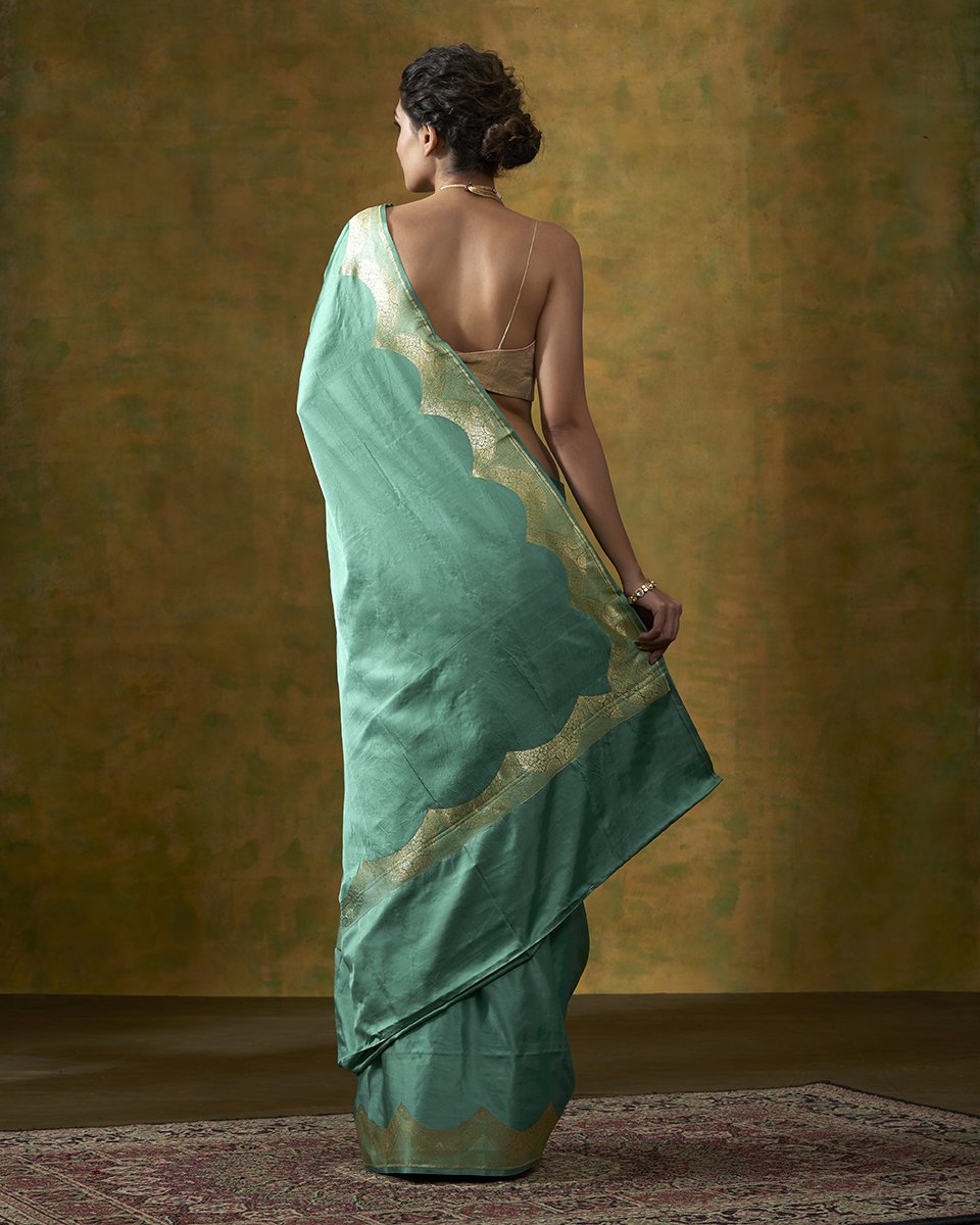 Green_Handloom_Plain_Satin_Saree_With_Zari_Border_WeaverStory_03