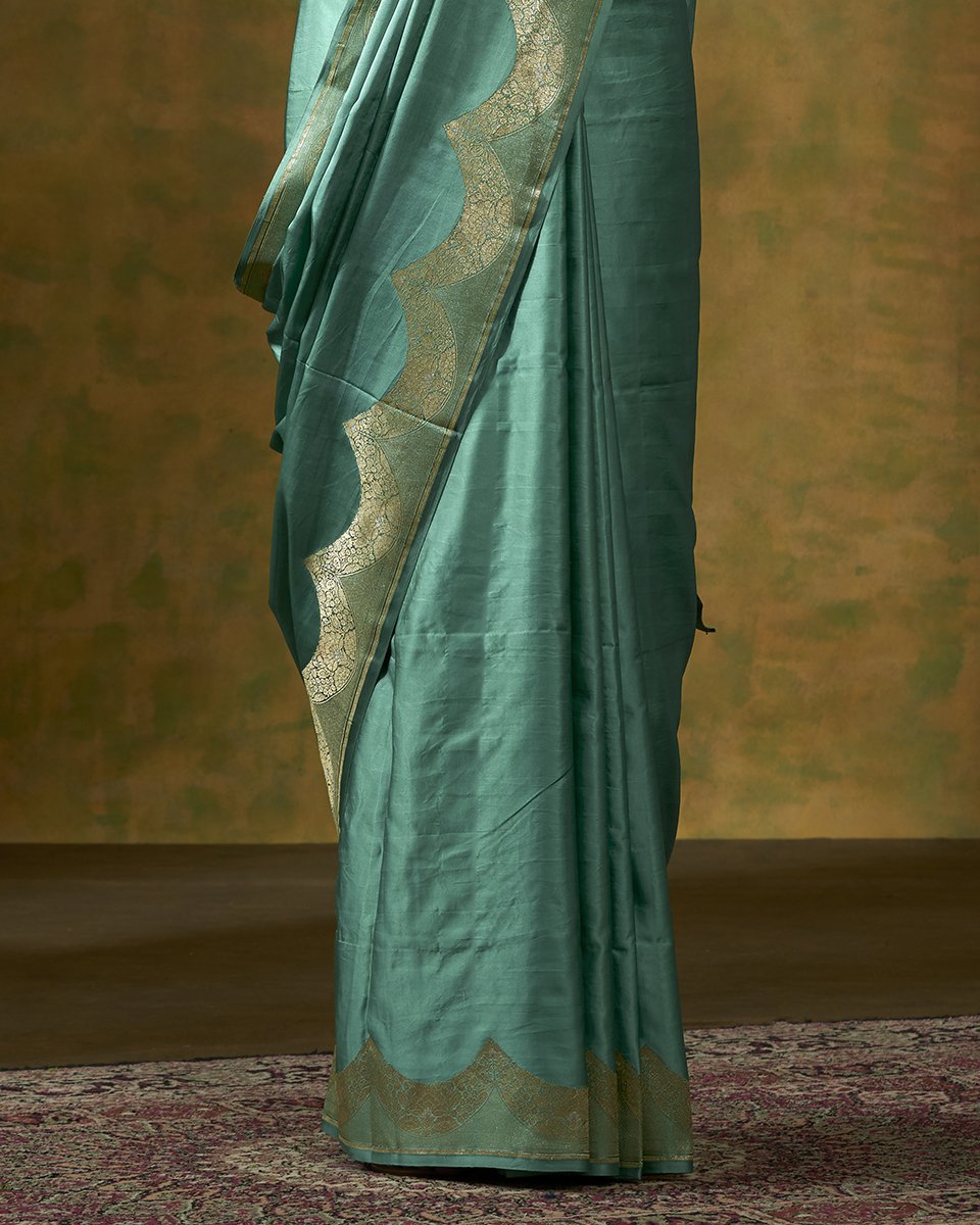 Green_Handloom_Plain_Satin_Saree_With_Zari_Border_WeaverStory_04