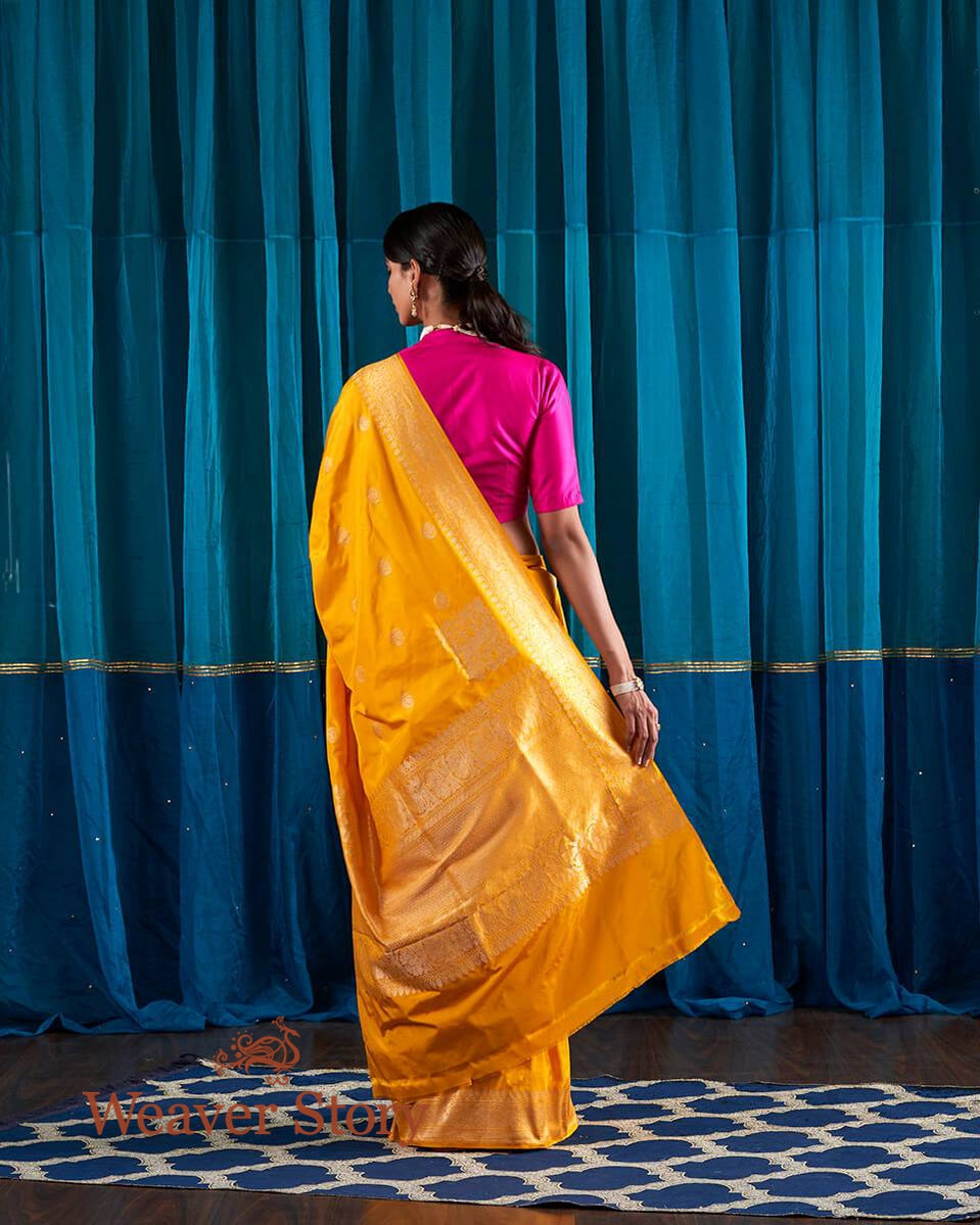 Sunshine_Yellow_Banarasi_Handloom_Saree_with_Kadhwa_Booti_and_Lion_Motifs_on_Pallu_WeaverStory_03