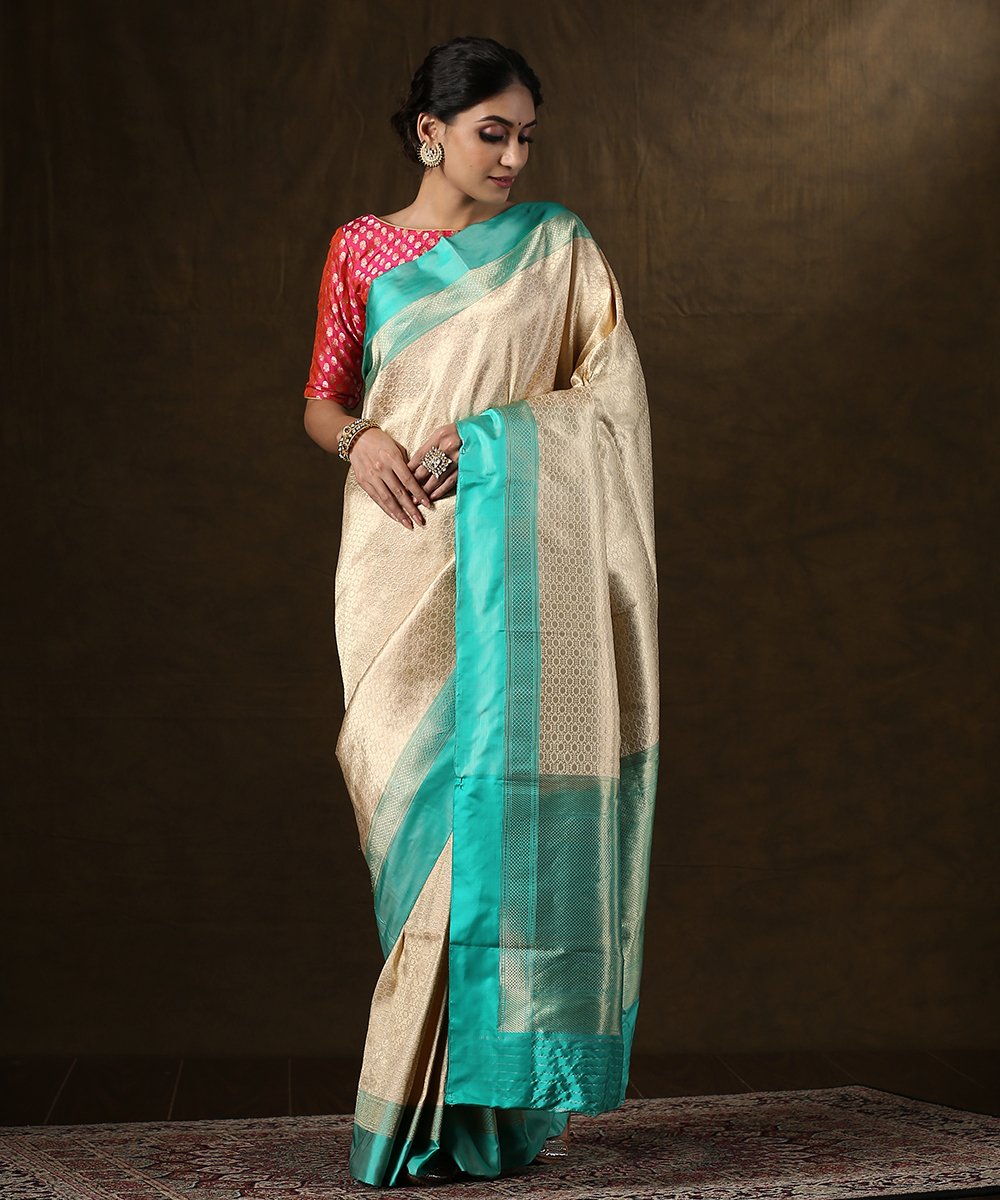 Handloom_Offwhite_and_Gold_Zari_Brocade_Banarasi_Saree_With_Aqua_Satin_Silk_Border_WeaverStory_02