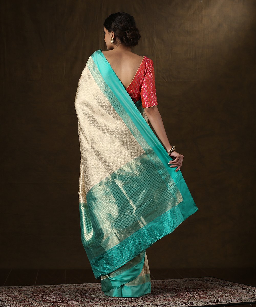 Handloom_Offwhite_and_Gold_Zari_Brocade_Banarasi_Saree_With_Aqua_Satin_Silk_Border_WeaverStory_03