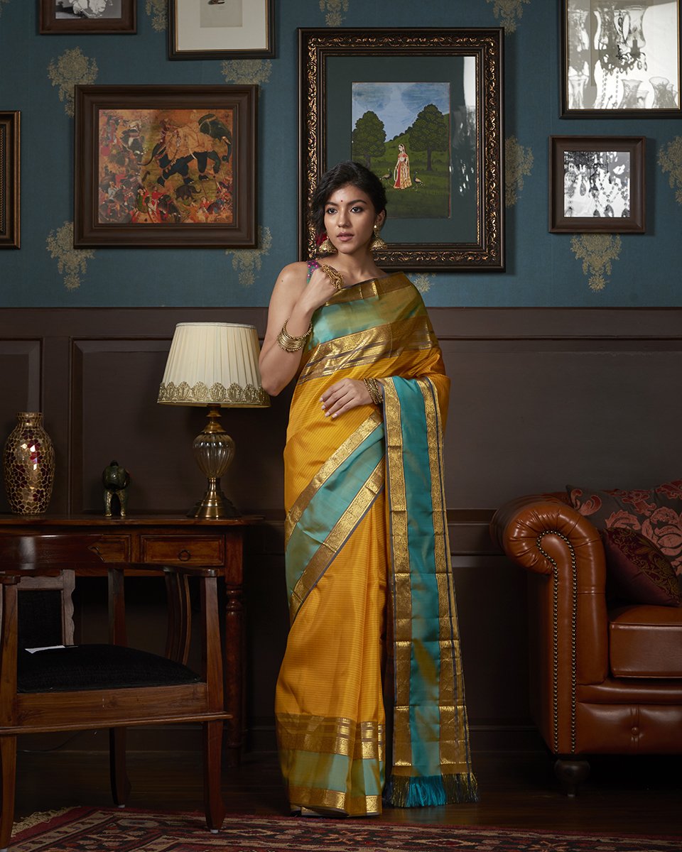 Handloom_Mustard_Striped_Kanjivaram_Silk_Saree_With_Grey_And_Green_Border_WeaverStory_02