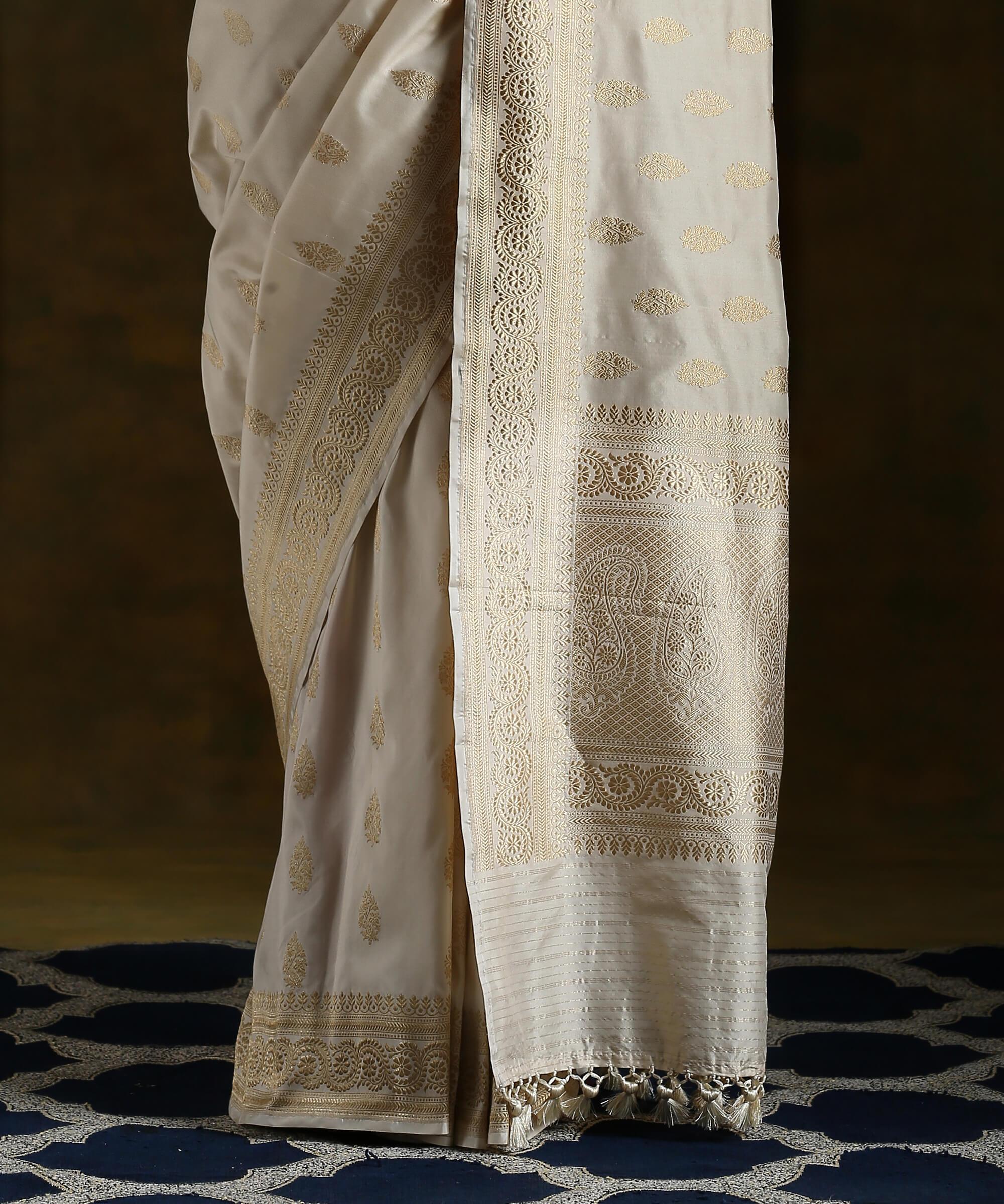 Handloom_Offwhite_And_Gold_Kadhwa_Booti_Saree_WeaverStory_04