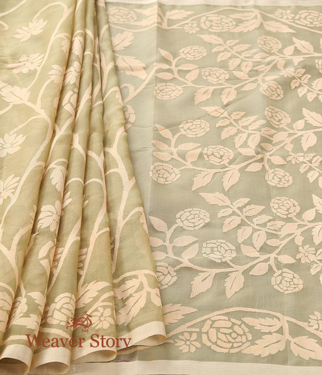 Handwoven_Pistachio_Green_Muslin_Jamdani_Saree_with_Floral_Pattern_Woven_All_Over_WeaverStory_02