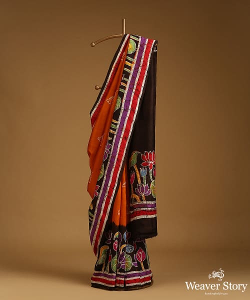 Handloom_Orange_And_Brown_Pure_Mulberry_Silk_Hand_Batik_Saree_With_Multicolour_Flowers_WeaverStory_01