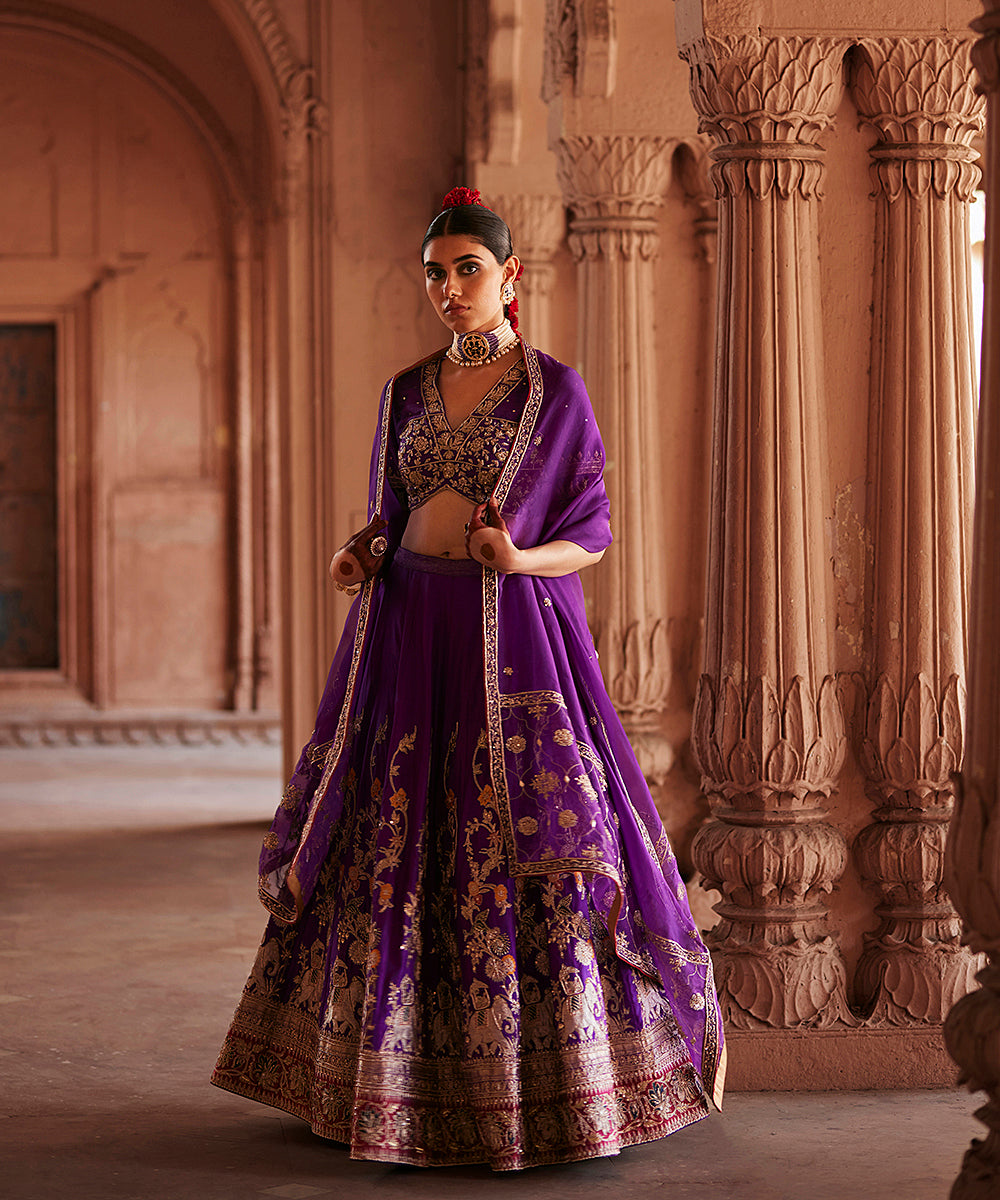Deep_Purple_Hand_Embroidered_Zardozi_Banarasi_Kalidar_Lehenga_With_Choli_Cut_Blouse_And_Dupatta_WeaverStory_01