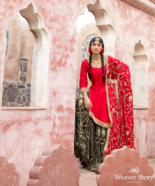 Green_Handloom_Velvet_Zardozi_Embroidery_Gararah_With_Red_Kurti_And_Red_Heavy_Embroidery_Chignon_Dupatta_WeaverStory_01