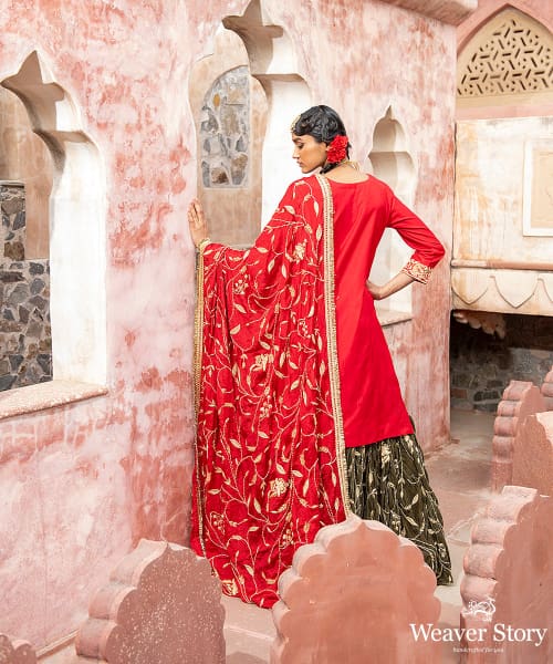 Green_Handloom_Velvet_Zardozi_Embroidery_Gararah_With_Red_Kurti_And_Red_Heavy_Embroidery_Chignon_Dupatta_WeaverStory_04