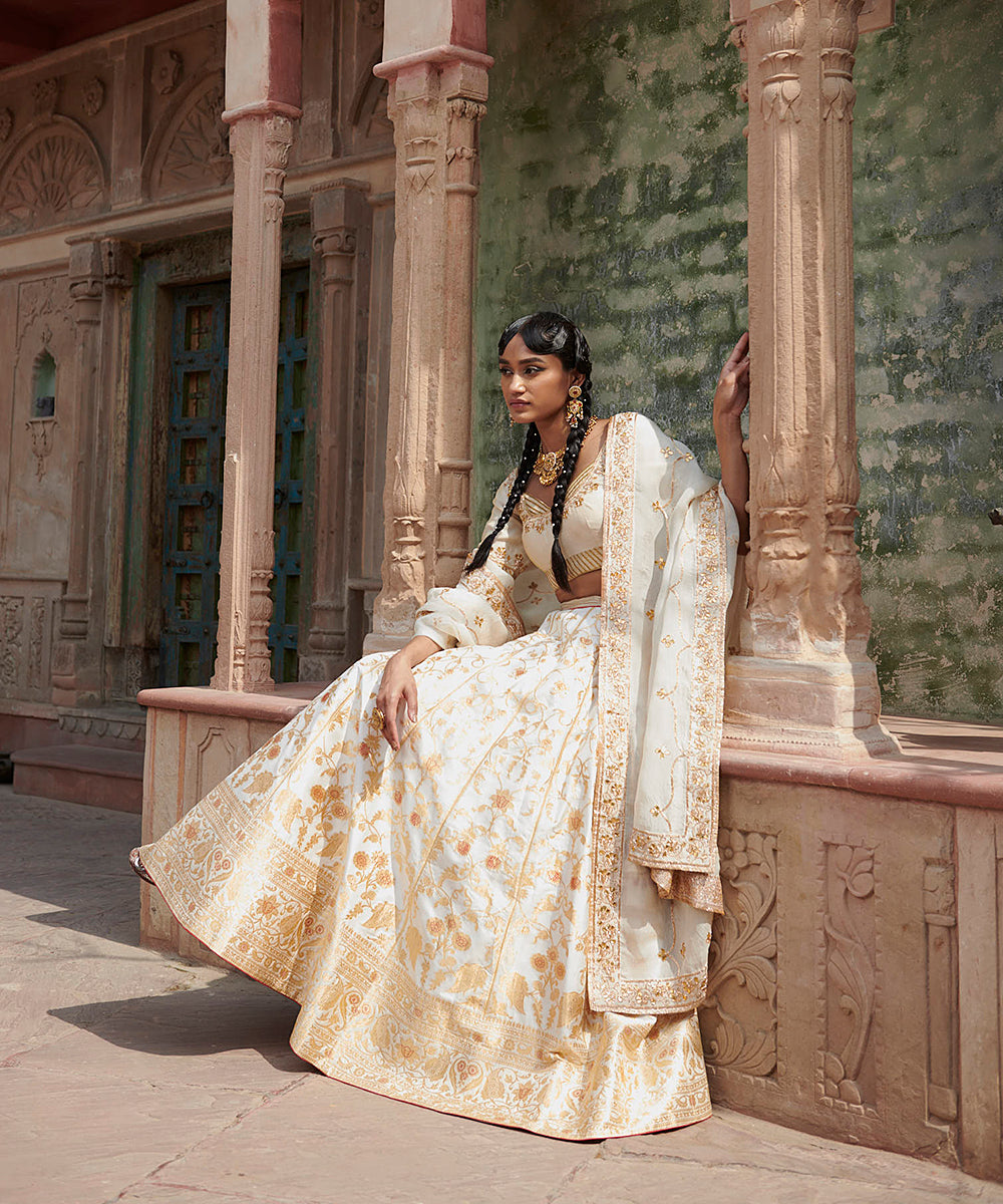 Handloom_White_Mughal_Jaal_Pure_Katan_Silk_Banarasi_lehenga_with_Gotta_work_Zardozi_Dupatta_and_Blouse_WeaverStory_03
