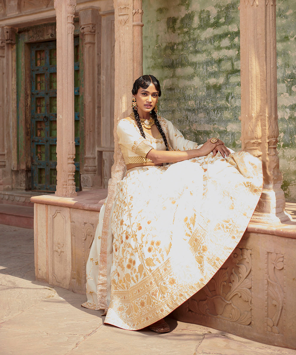 Handloom_White_Mughal_Jaal_Pure_Katan_Silk_Banarasi_lehenga_with_Gotta_work_Zardozi_Dupatta_and_Blouse_WeaverStory_04