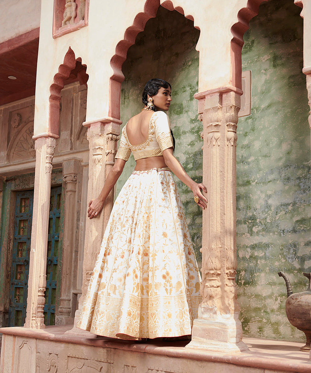 Handloom_White_Mughal_Jaal_Pure_Katan_Silk_Banarasi_lehenga_with_Gotta_work_Zardozi_Dupatta_and_Blouse_WeaverStory_05