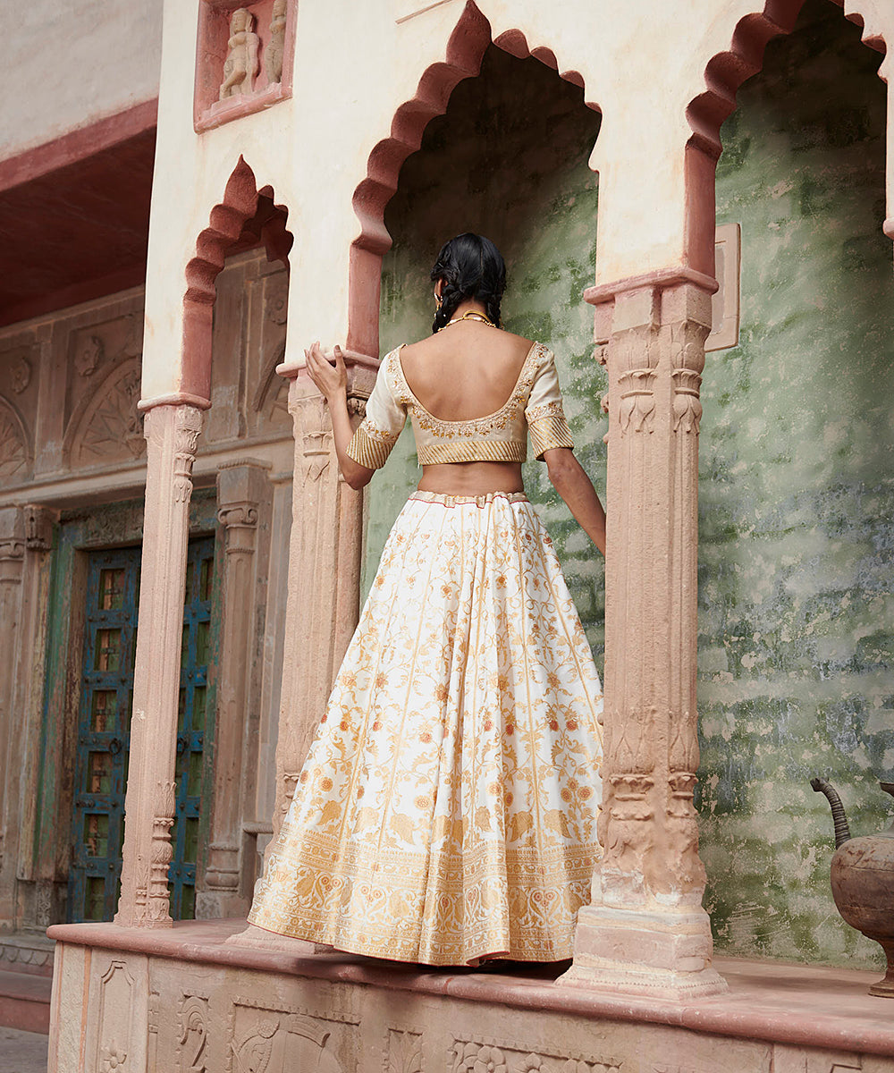 Handloom_White_Mughal_Jaal_Pure_Katan_Silk_Banarasi_lehenga_with_Gotta_work_Zardozi_Dupatta_and_Blouse_WeaverStory_06