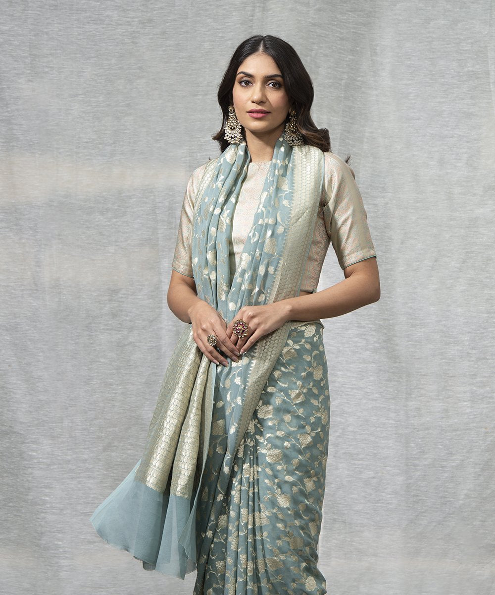 Light_Blue_Handloom_Georgette_Jangla_Banarasi_Saree_with_Zari_Floral_Jaal_WeaverStory_01