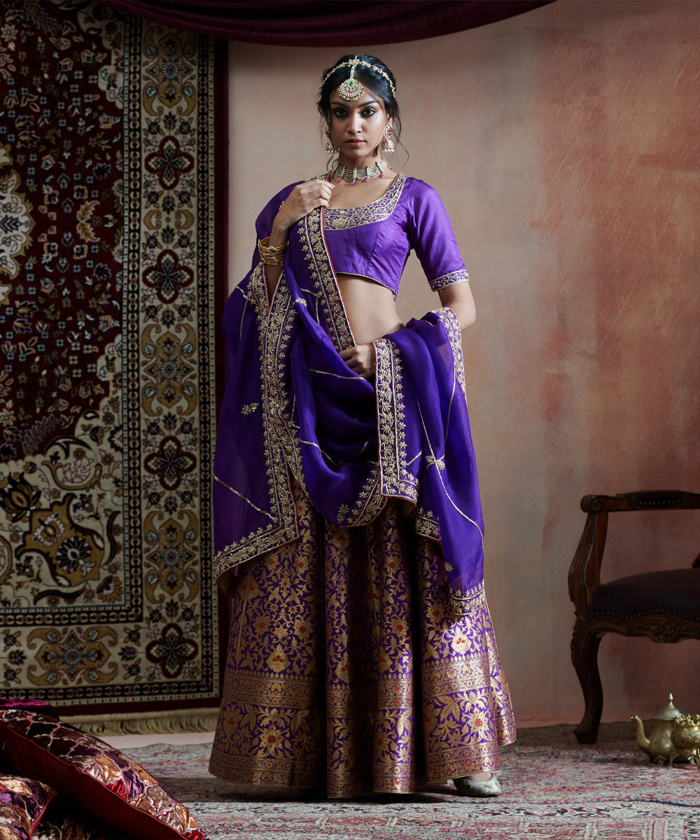 Handloom Purple Hand Embroidered Pure Katan Silk Banarasi Bageecha Lehenga With Blouse And Organza Dupatta