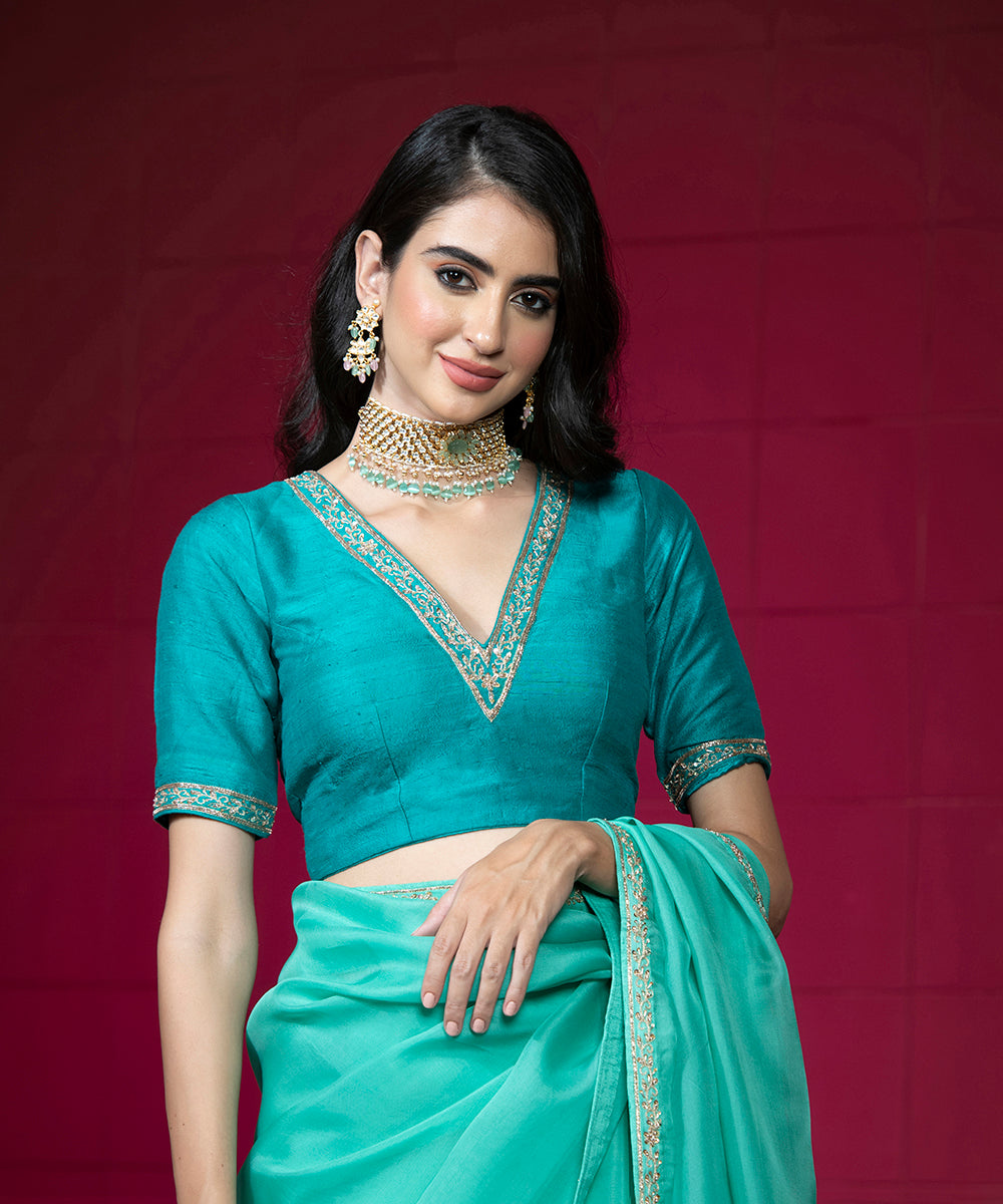 Handloom_Aqua_Blue_Organza_Saree_with_Embroidered_Motifs_And_Sea_Green_Raw_Silk_Blouse_WeaverStory_04